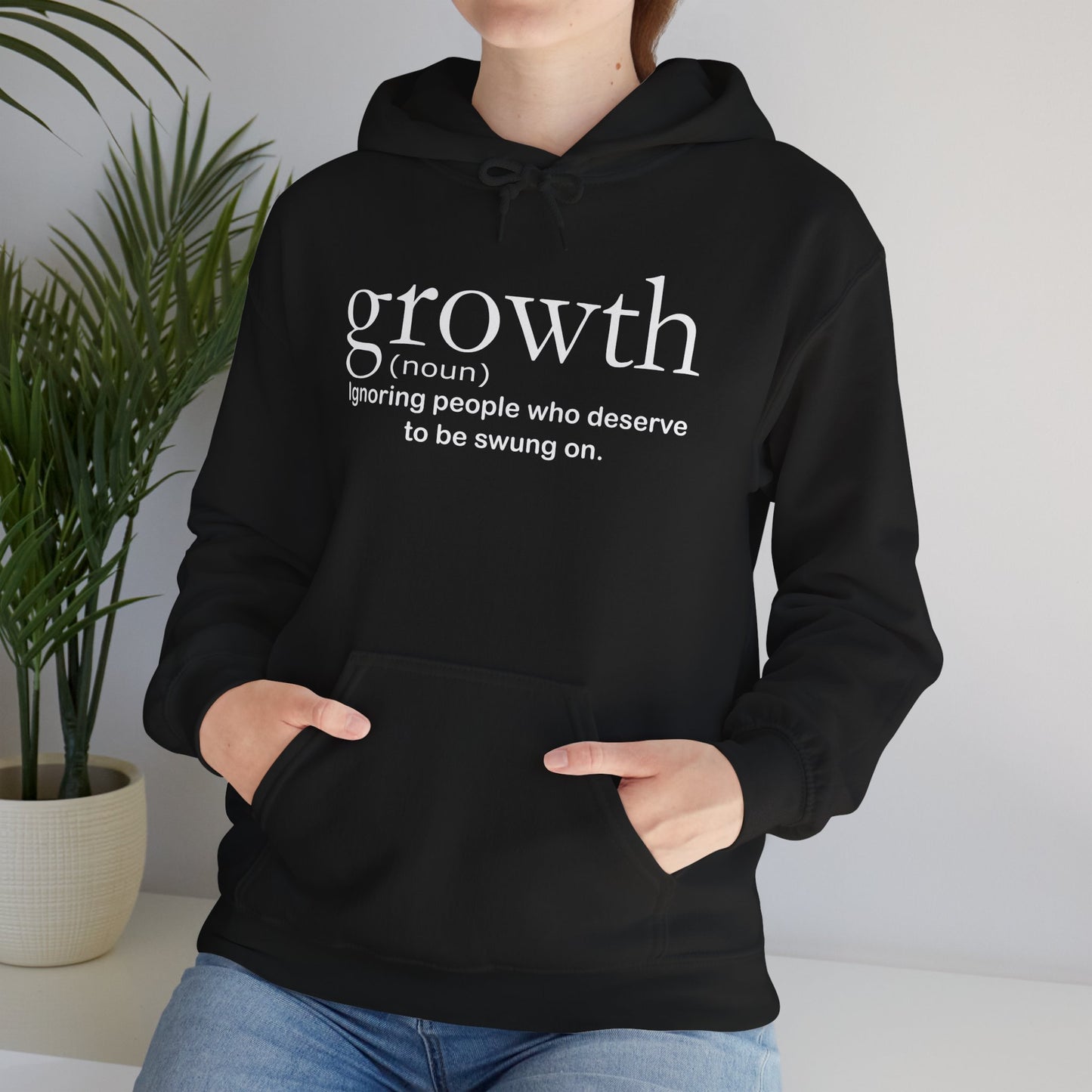 Hoodie — "growth (noun) Ignoring people who deserve to be swung on." Motivational Black Pullover